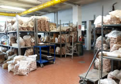 Large number of unfinished bowls that accumulate in the stock room